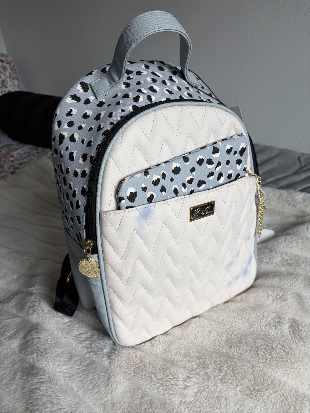 Betsey Johnson Ivory Quilted Mini Backpack with Light Blue Leopard Accents